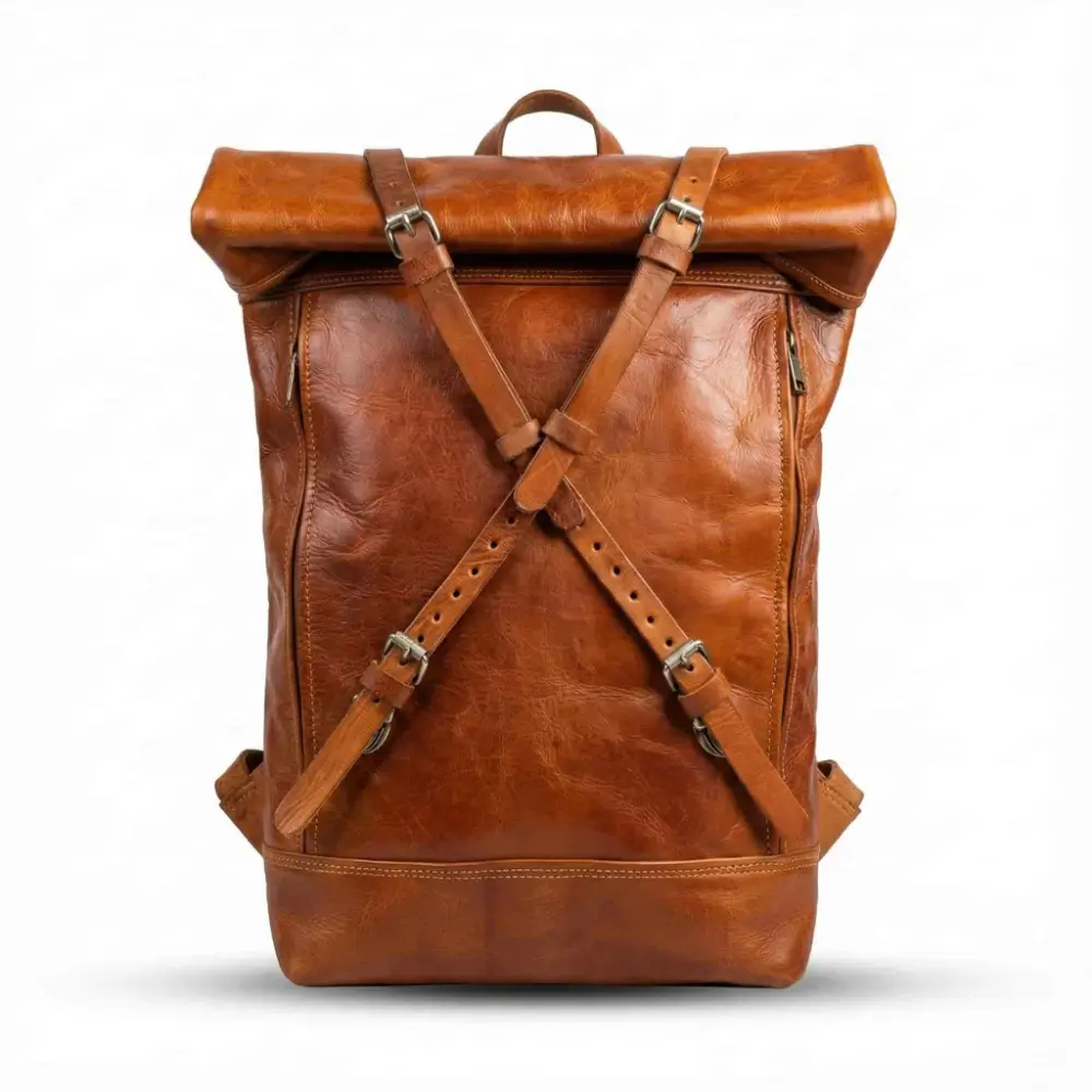 Leather roll top backpack front view tan X-strap closure